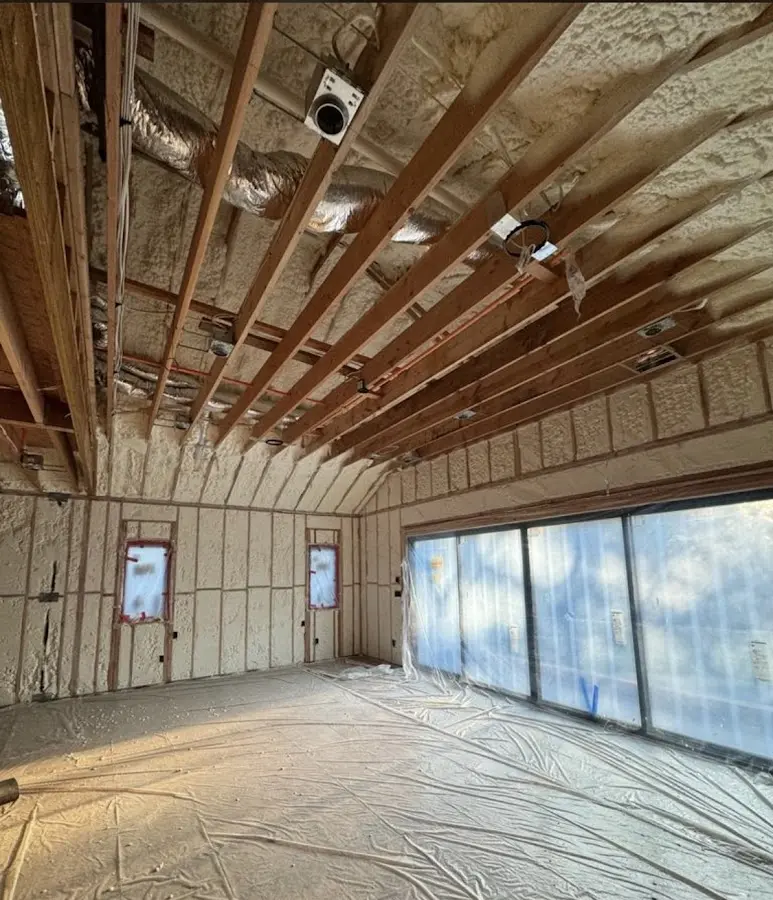 Interior walls and ceiling insulated with spray foam during new construction in Bellingham